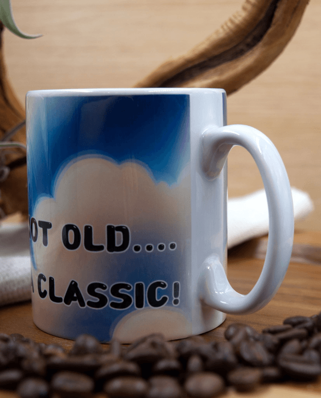 Mug: Vintage Plane Against Clear Blue Sky Design