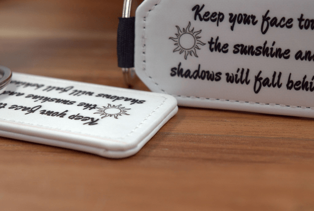 Keep Your Face Towards the Sunshine," Sun Silhouettes Design, Double-Sided PU Leather Keychain