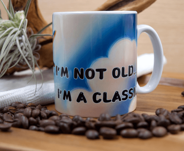 Mug: Vintage Plane Against Clear Blue Sky Design