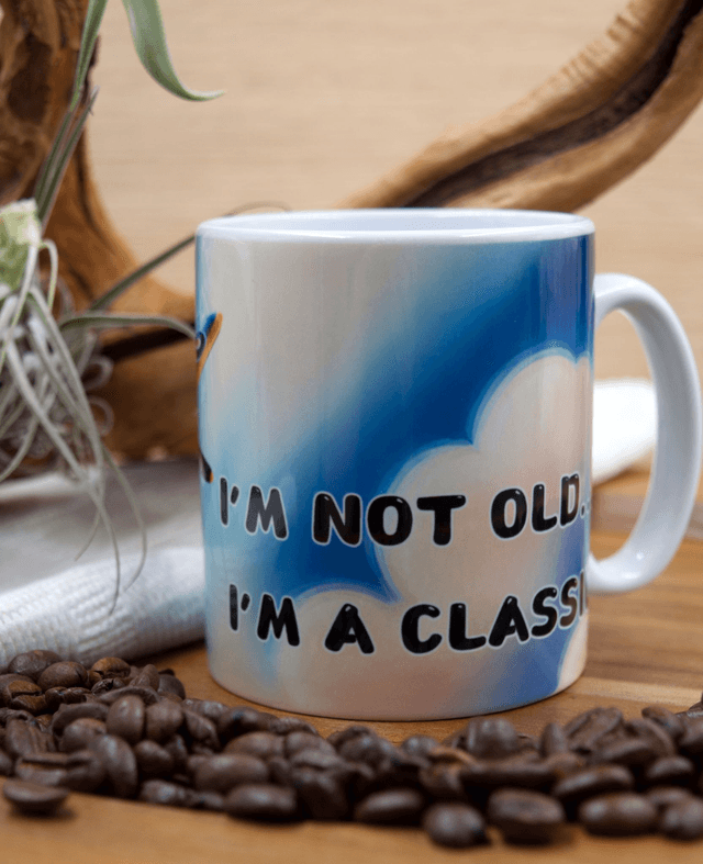 Mug: Vintage Plane Against Clear Blue Sky Design