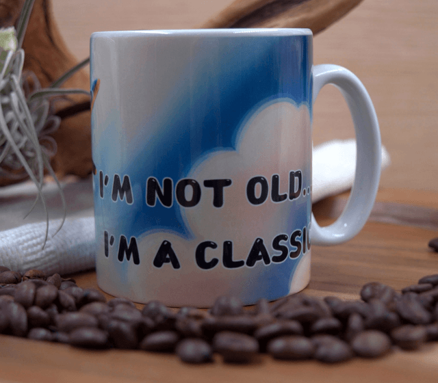 Mug: Vintage Plane Against Clear Blue Sky Design