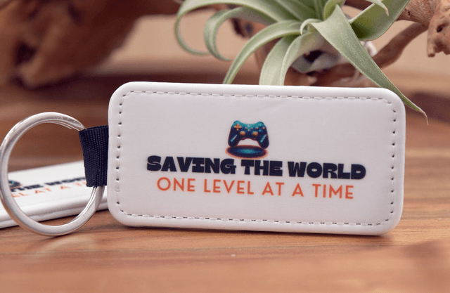 Key Ring – &quot;Saving the World One Level at a Time,&quot; Gaming Controller Design, Double-Sided PU Leather Keychain