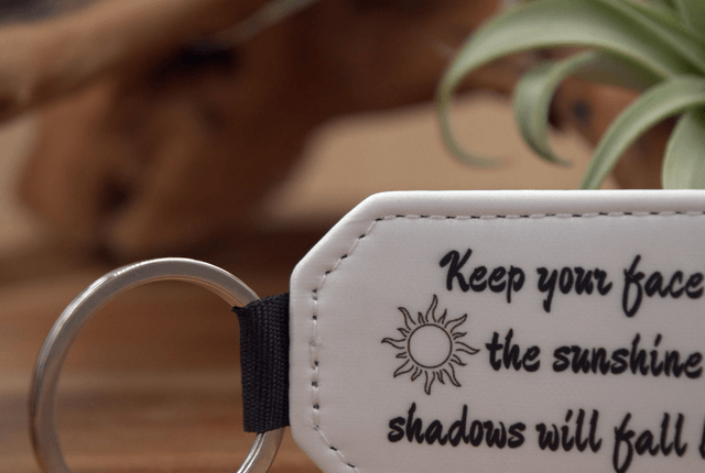 Keep Your Face Towards the Sunshine," Sun Silhouettes Design, Double-Sided PU Leather Keychain