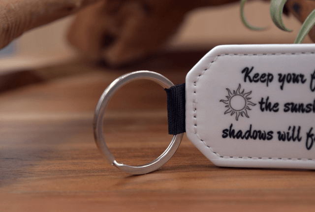Keep Your Face Towards the Sunshine," Sun Silhouettes Design, Double-Sided PU Leather Keychain