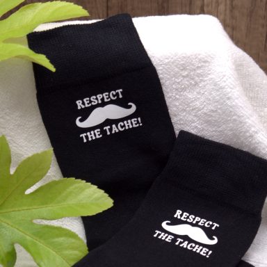 Introducing our dapper black socks, paying homage to the stately moustache!